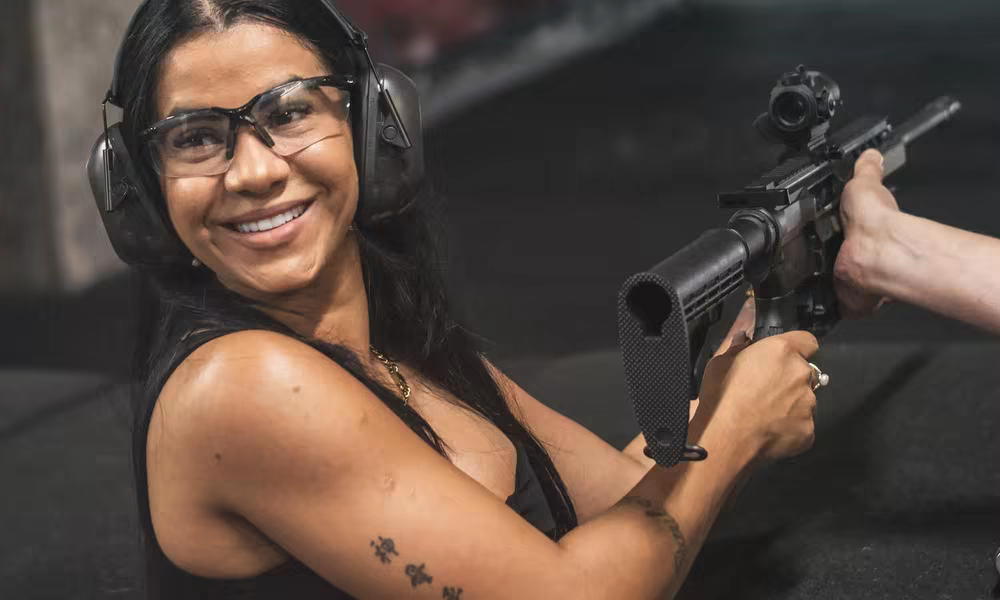 Woman aiming a rifle at Capital Shooting Range Budapest