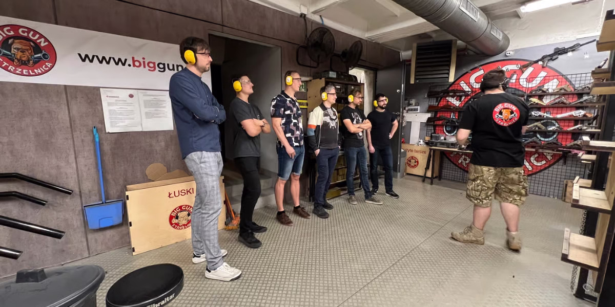 Group safety briefing with instructor at BIG GUN shooting range Kraków